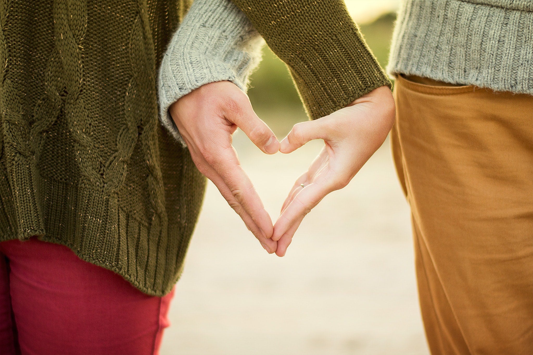 Two hands in heart-shape