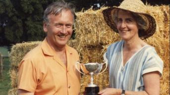Tim and Felicity holding a trophy