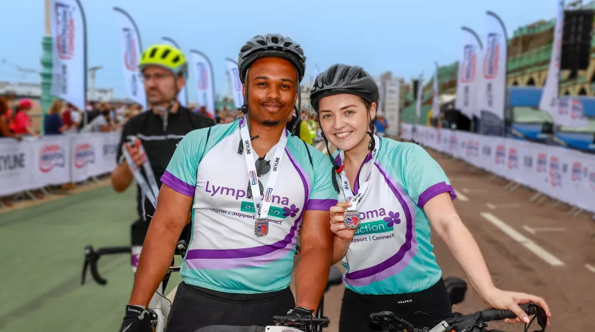 two cyclists at the finish line 