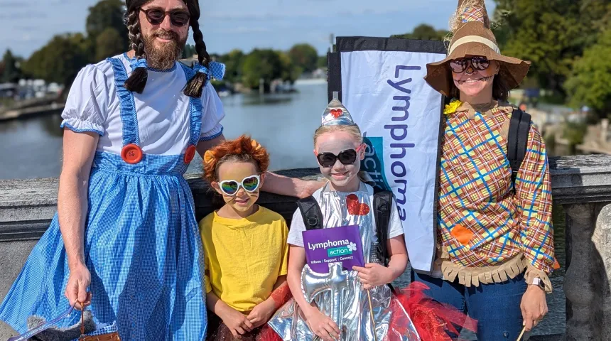 a family of four dressed up as wizard of OZ 