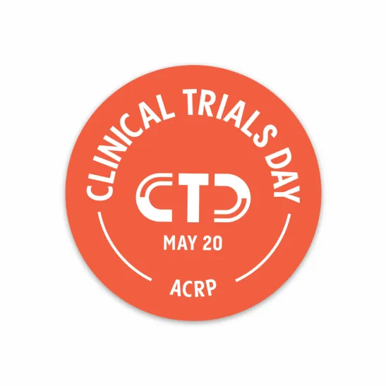 International Clinical Trials Day logo. Orange circle with white writing.