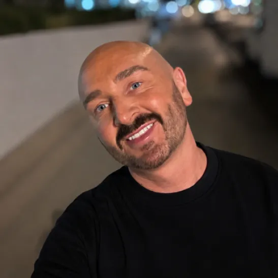 A selfie of Ben smiling to the camera